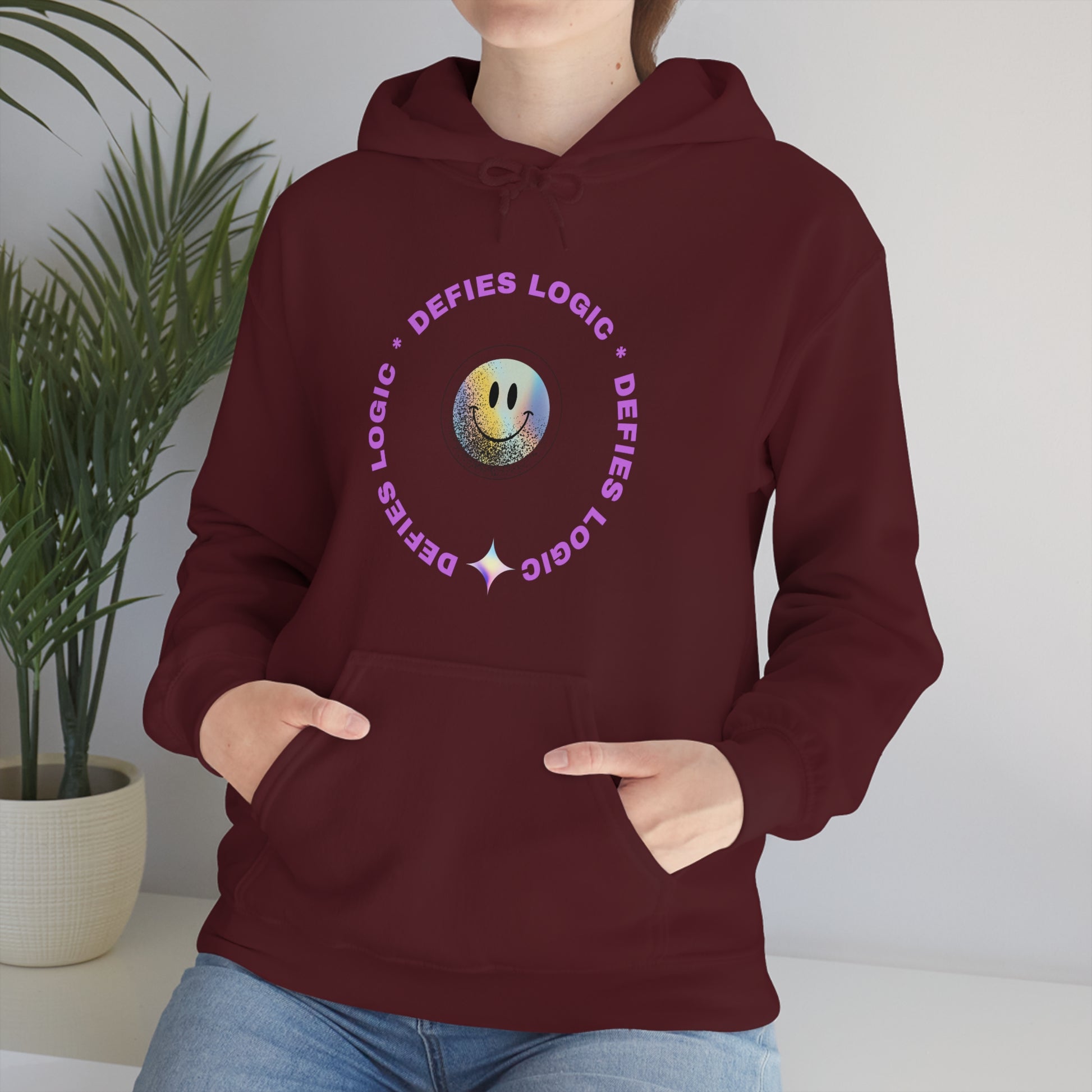 Defies Logic Unisex sweatshirt